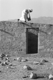 Boy Building a House