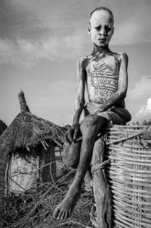 A woven basket as his throne